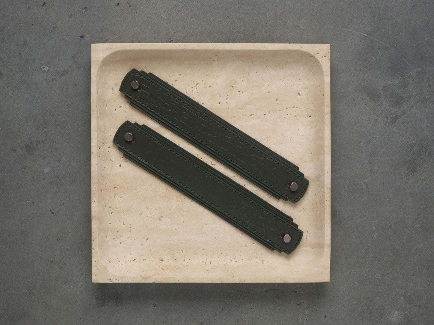 Khaki leather handle by Sagitine, featuring sturdy construction and elegant design.