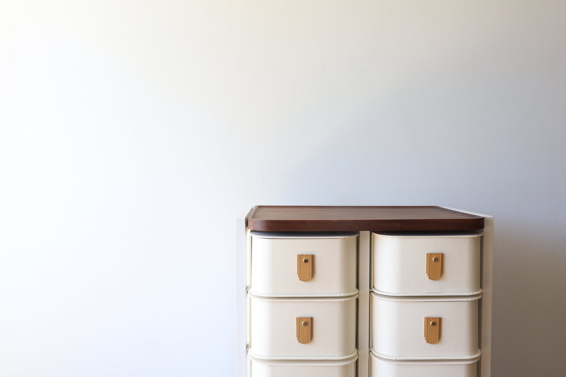 Biscuit leather pull handle by Sagitine, sleek design ideal for cabinets or drawers
