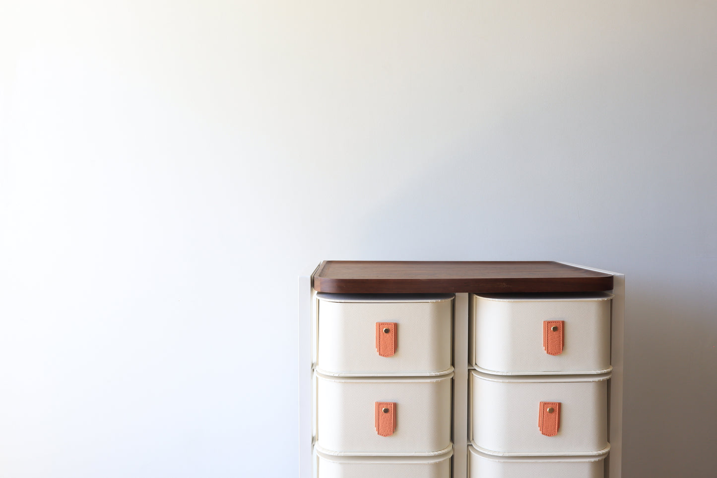 Apricot leather pull handle from Sagitine, featuring a smooth finish and modern design.